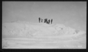 Image of Seven men on snow ridge